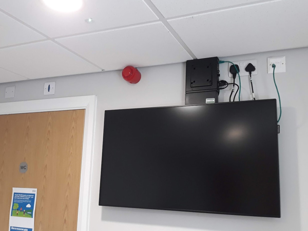 TV screen and sound system installed into a doctors surgery and dental practice